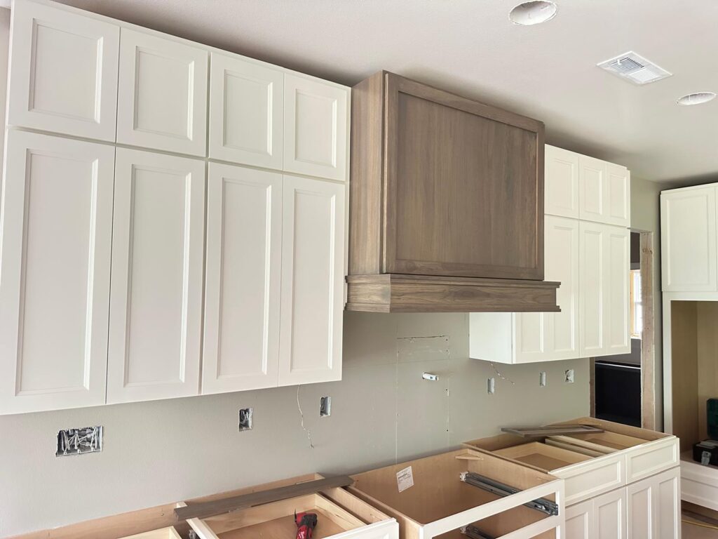Modern high-end custom kitchen with bespoke cabinetry and premium finishes.