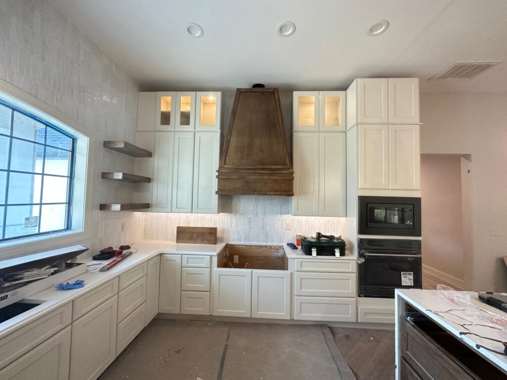 Modern high-end custom kitchen with bespoke cabinetry and premium finishes.