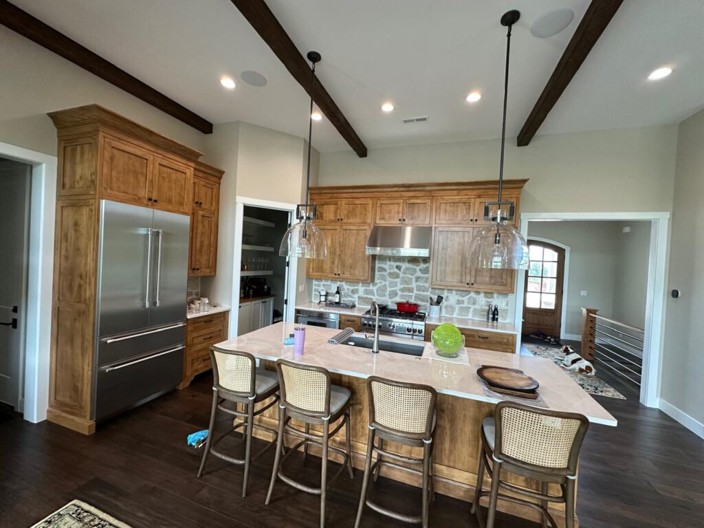 Massive handcrafted kitchen island made of premium wood, designed for functional luxury and durability.